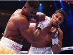 anthony-joshua-memukul-francis-ngannou.jpg
