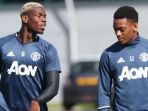 anthony-martial-dan-paul-pogba_20180409_031528.jpg