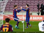 antoine-griezmann-turut-merayakan-gol-yang-dicetak-oleh-lionel-messi.jpg