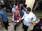 antrian-pembagian-zakat-fitrah-masjid-raya-bandung_20190608_074423.jpg