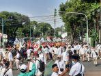 arak-arakan-gerindra-dan-pkb-daftar-ke-kpu.jpg<pf>arak-pkb-dan-gerindra-daftar-ke-kpu.jpg