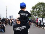 aremania-gelar-aksi-solidaritas-tragedi-kanjuruhan_20221120_152425.jpg