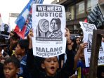aremania-lakukan-aksi-blokade-tutup-jalan-fly-over-malang_20221211_115537.jpg