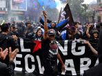 aremania-tuntut-pelanggaran-ham-berat-atas-tragedi-kanjuruhan_20221127_215132.jpg