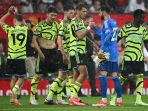 arsenal-kembali-ke-puncak-klasemen-liga-inggris-usai-kalahkan-mu_20240513_074500.jpg