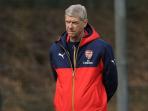 arsene-wenger-tangankebelakang_20160401_213053.jpg