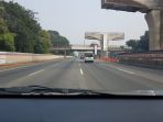 arus-lalu-lintas-tol-jakarta-cikampek-di-kawasan-bekasi-timur-kedua-arah-relatif-lancar_20180610_085221.jpg