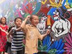 asyiknya-kampoeng-jadoel-di-rejomulyo-dinding-dan-tembok-jalan-dipenuhi-lukisan-batik_20170408_214233.jpg