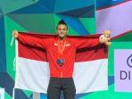 atlet-angkat-besi-rizky-juniansyah-lolos-olimpiade-paris-2024.jpg