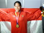 atlet-para-swimming-syuci-indriani-raih-emas-1_20181009_021415.jpg