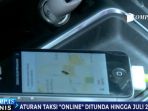 aturan-taksi-online-ditunda-hingga-juli-2017_20170330_133400.jpg