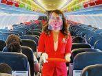 awak-kabin-airasia-di-penerbangan-bernuansa-kemerdekaan.jpg