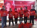 bagi-beras-kantong-merah.jpg