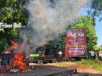 baliho-yang-berisi-wajah-pelaku-kekerasan-terhadap-putu-satria.jpg