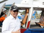 bambang-soesatyo-saat-akan-menaiki-helikopter-meninggalkan-pos-keamanan-cikopo_20180610_124152.jpg