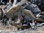 bangunan-yang-runtuh-di-kamp-pengungsi-al-maghazi-di-jalur-gaza-tengah.jpg