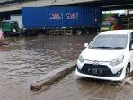 banjir-dan-rob-tol-kaligawe.jpg