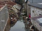 banjir-di-depok-tanggul-jebol.jpg