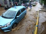 banjir-di-jalan-cikutra-barat-kota-bandung_20181127_174255.jpg
