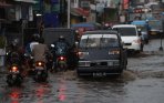 banjir-di-jalan-galunggung-kota-malang_20141221_112502.jpg