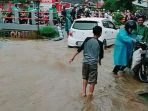 banjir-di-jalan-grogol-limo-depok-di-depan-spbu_20170221_121056.jpg