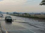 banjir-di-jalan-tol-padaleunyi-km-130.jpg