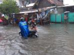 banjir-di-keagungan-taman-sari_20150209_125037.jpg