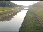 banjir-kanal-timur-dipenuhi-busa-putih.jpg