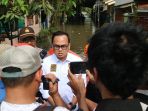 banjir-kembali-landa-wilayah-total-persada-tangerang_20200206_094048.jpg