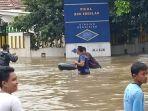 banjir-lagi-nih-bikin-peer-aja.jpg
