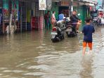 banjir-merendam-di-kawasan-rawa-buaya_20210216_220518.jpg