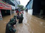 banjir-rendam-sejumlah-kawasan-di-jakarta-timur_20200101_205910.jpg