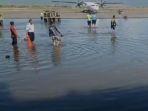 banjir-rob-di-bandara-bima.jpg