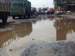 banjir-rob-di-kota-semarang-jawa-tengah-sabtu-2562016_20160625_155537.jpg