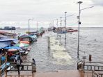 banjir-rob-rendam-dermaga-kali-adem_20210101_180553.jpg