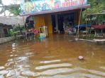 banjir-yang-melanda-kota-ta.jpg