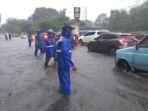 banjir-yang-merendam-jalan-di-panjait.jpg