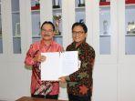bank-dki-dan-bank-papua.jpg