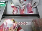bank-indonesia-polda-jabar-musnahkan-14294-lembar-uang-palsu_20180912_220911.jpg