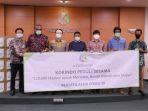 bantuan-120-ribu-lembar-masker-untuk-kabupaten-merauke-boven-digoel-dan-mappi-dari-korindo-group.jpg