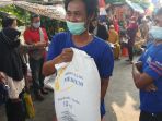 bantuan-beras-ppkm-untuk-warga-terdampak_20210731_122800.jpg