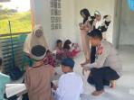 Personel Satbrimob Polda Gorontalo Dukung Fasilitas Belajar Mengaji di Mushola Isimu Utara