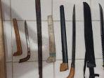 barang-bukti-kasus-kericuhan-di-kampus-halu-uleo.jpg