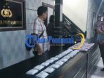 barang-bukti-sabu-2-kg-dan-15000-pil-ekstasi-di-mapolresta-pontianak_20161209_232159.jpg
