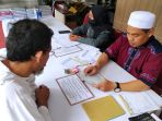 bayar-zakat-fitrah-di-masjid-pusdai-jabar_20230414_180115.jpg