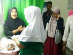 bayi-berjenis-kelamin-perempuan-berbalut-kain-hitan-dite_20171004_144402.jpg