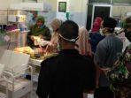 bayi-laki-laki-yang-ditemukan-warga-di-atas-genting-rumah-warga.jpg