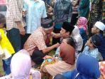 bebas-nur-azis-dan-rusmin-disambut-ratusan-warga.jpg