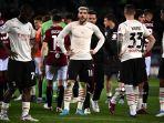 bek-ac-milan-prancis-theo-hernandez-tengah-bereaksi.jpg