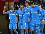 bek-atletico-madrid-renan-lodi-kiri-merayakan-setelah-mencetak-gol-ke-gawang-man-united.jpg